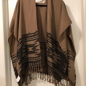 Beautiful tan and black poncho, NWT.